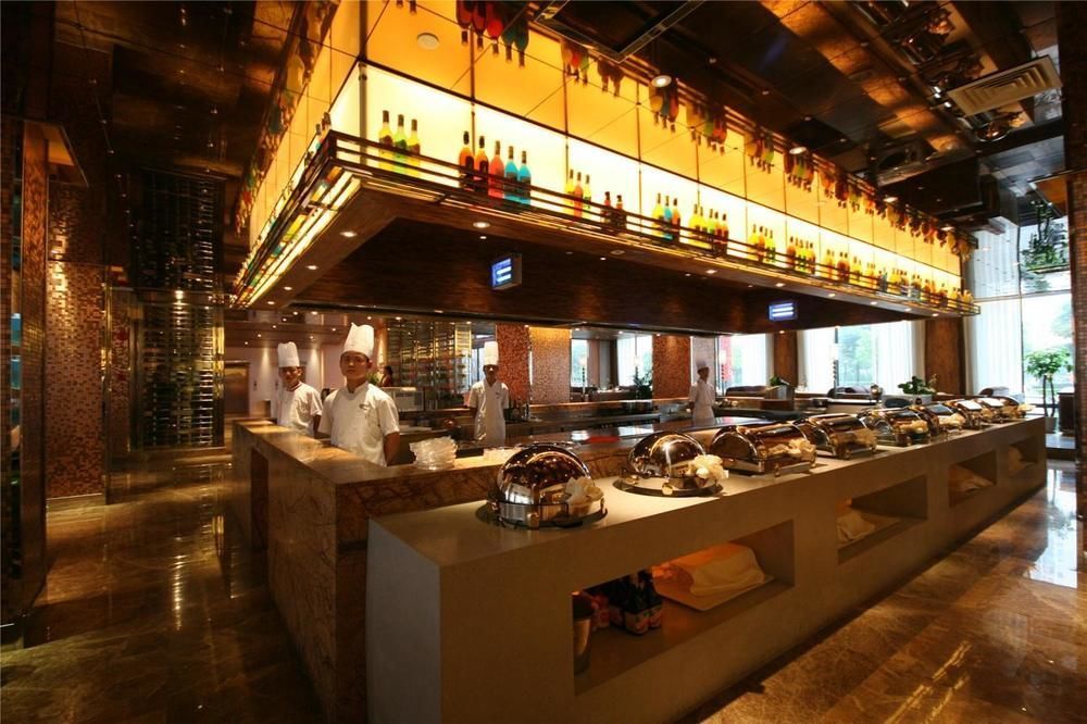 Four Seasons Rayli Hotel Ningbo Esterno foto