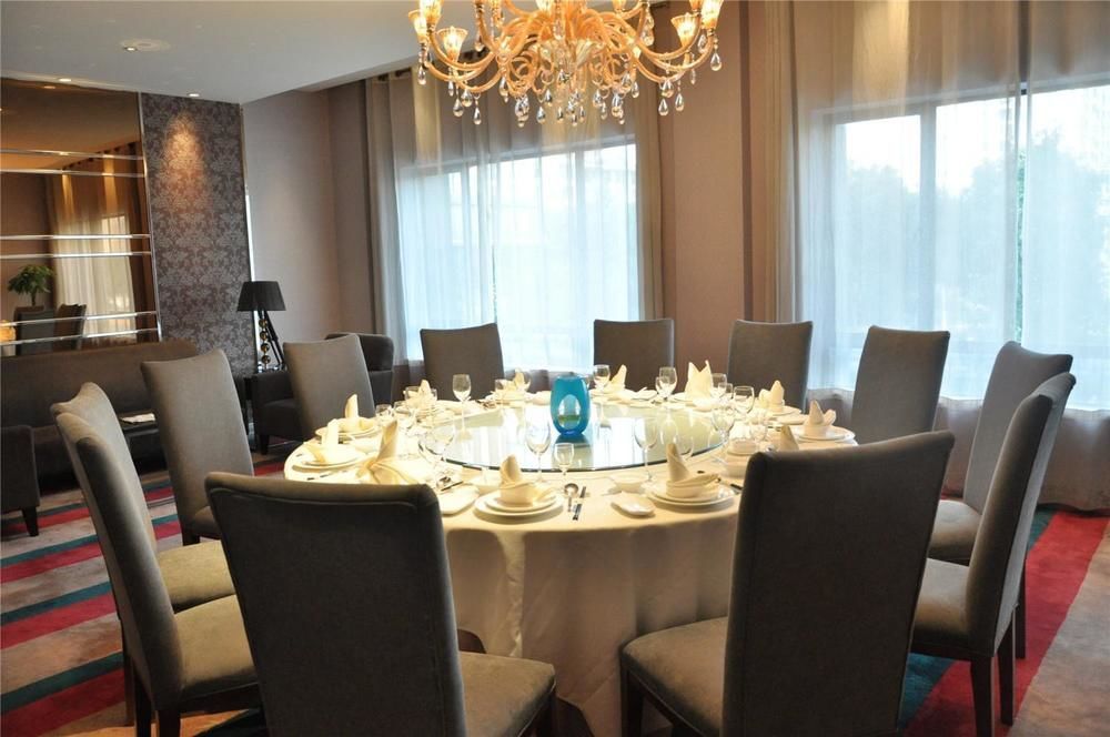 Four Seasons Rayli Hotel Ningbo Esterno foto