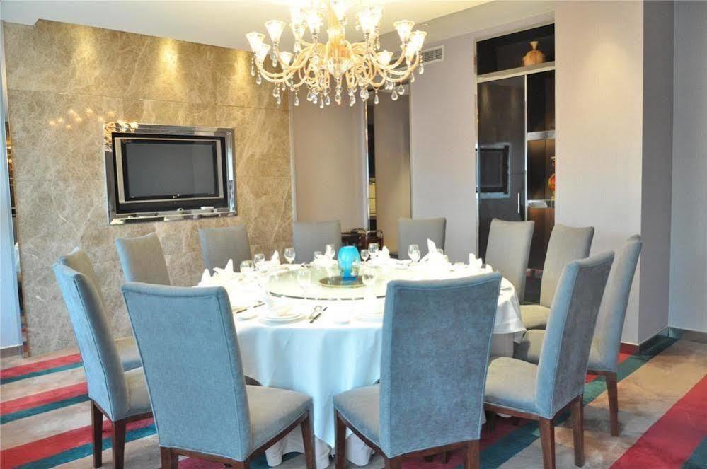 Four Seasons Rayli Hotel Ningbo Esterno foto