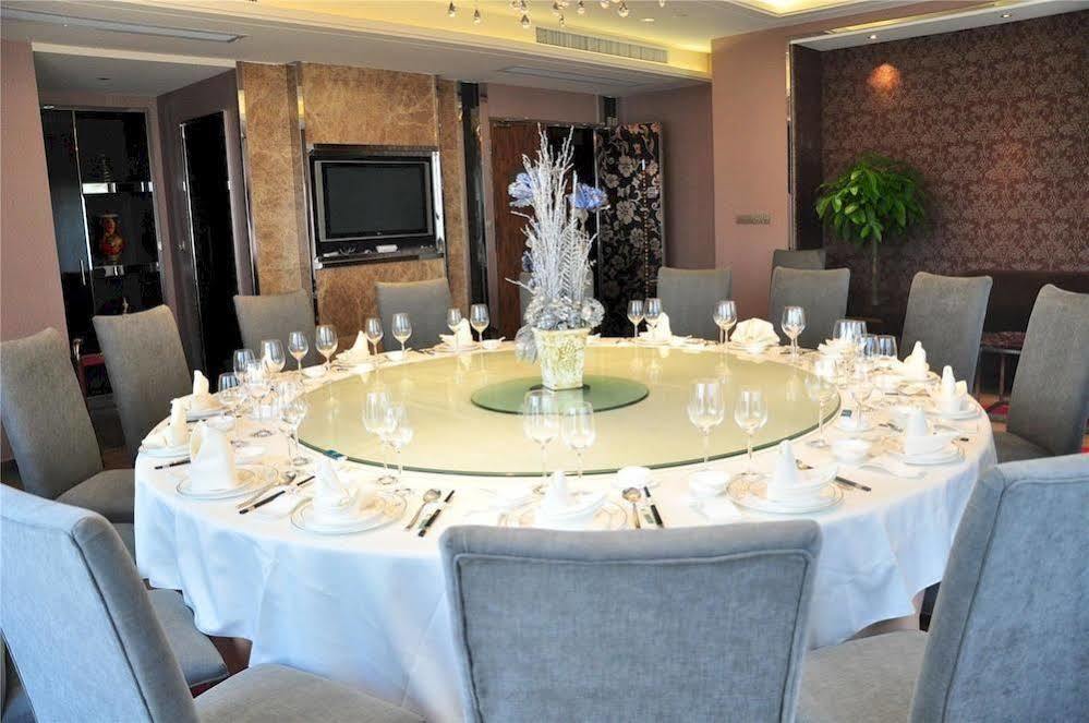 Four Seasons Rayli Hotel Ningbo Esterno foto