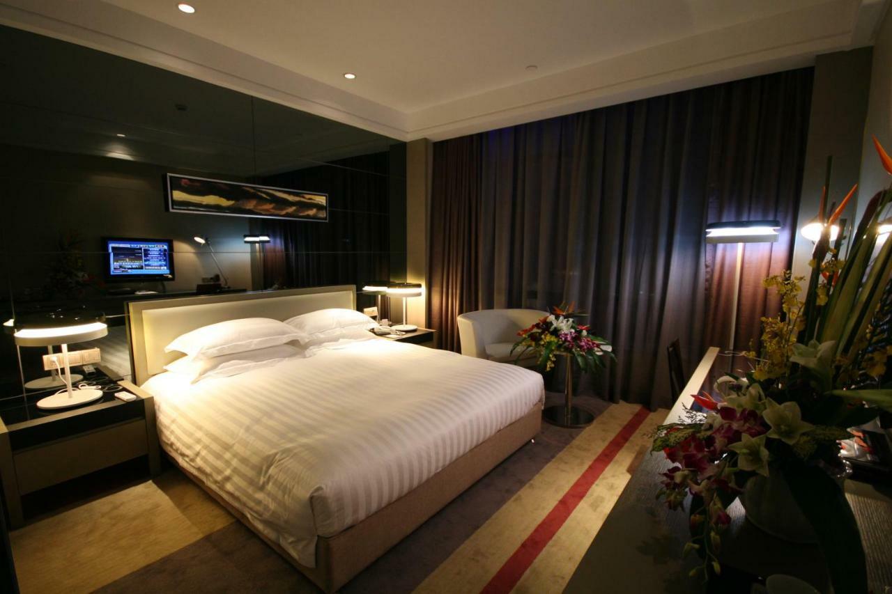 Four Seasons Rayli Hotel Ningbo Esterno foto