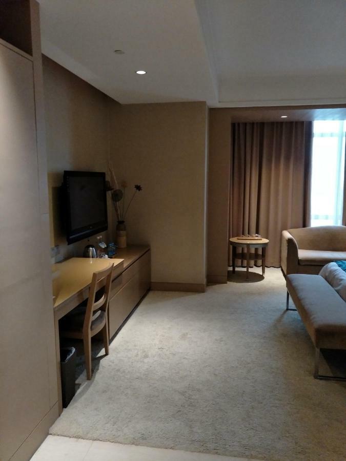 Four Seasons Rayli Hotel Ningbo Esterno foto