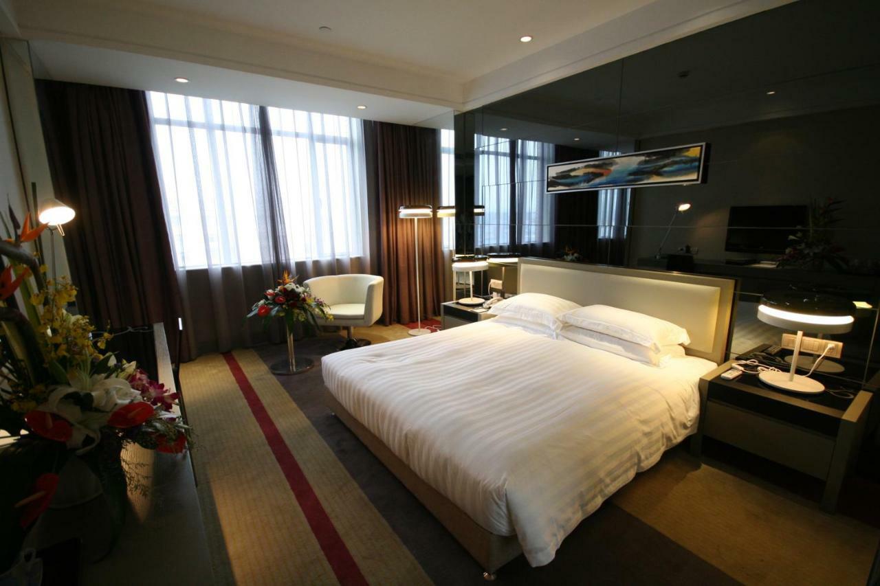Four Seasons Rayli Hotel Ningbo Esterno foto