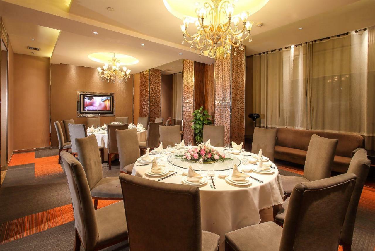Four Seasons Rayli Hotel Ningbo Esterno foto